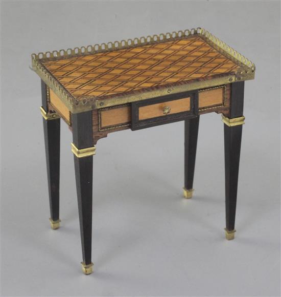 Denis Hillman. A Louis XVI style parquetry inlaid miniature table a ecrire, constructed of ten different woods, width 2.25in.